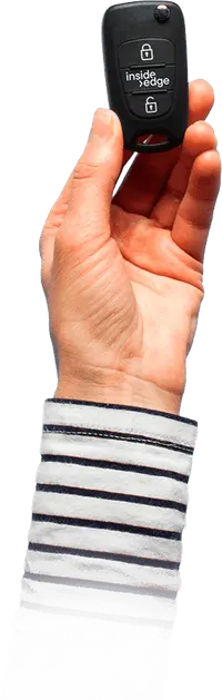 Hand holding IE car keys